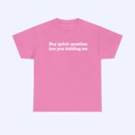 The Hey Quick Question Are You Kidding Me Shirt is a pink tee with bold white text, shown on a light background. This funny graphic shirt brings playful style to your wardrobe.