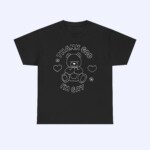 The Thank God I'm Gay Shirt features a black tee with a line-drawing teddy bear, hearts, and flowers, plus bold “THANK GOD I’M GAY” text—an ideal LGBTQ or Gay Shirt for celebrating pride and love.