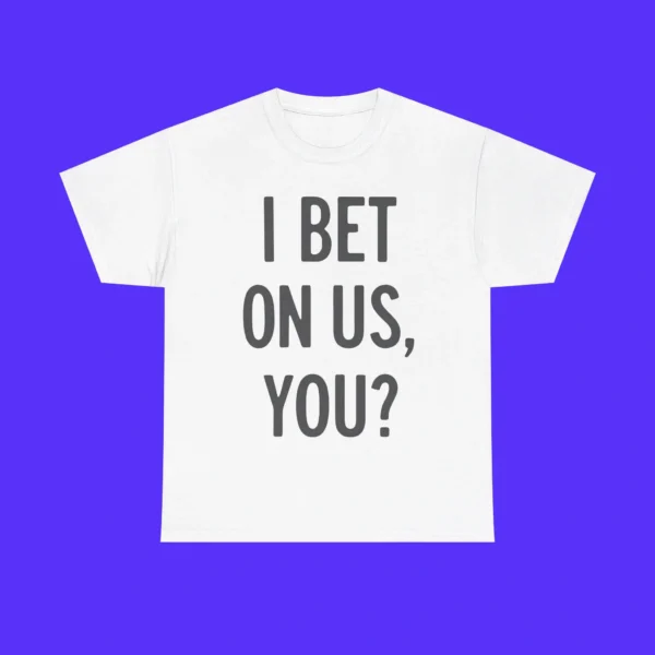 The I Bet On Us You Shirt features bold black "I BET ON US, YOU?" text on the front of a white tee, shown on a bright blue background.