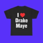 The I Love Drake Maye Shirt is black with bold white "I ♥ Drake Maye" text and a red heart symbol, shown on a solid bright blue background.