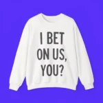 The I Bet On Us You Shirt showcases bold black text "I BET ON US, YOU?" on the front and is displayed flat against a vibrant purple background.