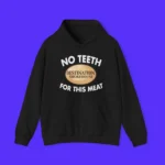 The No Teeth Destination Smokehouse For This Meat Shirt is a black hoodie featuring “NO TEETH FOR THIS MEAT” and “DESTINATION SMOKEHOUSE” in an oval on the chest, shown on a solid blue background—ideal for Smokehouse fans.