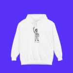 The Born Ready Shirt is shown on a white hoodie against a blue background, with a black-and-white photo of a young child in a sports uniform holding a baseball glove and the words “born ready” beneath the image.