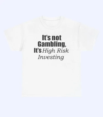 The It's Not Gambling It's High Risk Investing Shirt is a white shirt with the bold, italicized phrase "It's Not Gambling, It's High Risk Investing" printed on the front.
