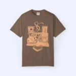 The Sabrina Carpenter House Tour Shirt is a brown tee with a detailed line art of a whimsical heart-themed building, featuring hearts, stairs, arches, and overlapping SC letters—perfect for any fan’s collection.