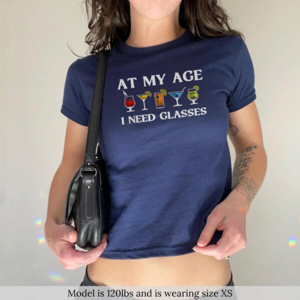 At My Age I Need Glasses Vintage Baby Tee – Funny Drinking Humor Top