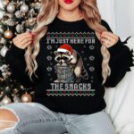 Funny Raccoon Christmas Sweatshirt – Cozy Snack Lover Crewneck