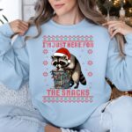 Funny Raccoon Christmas Sweatshirt – Cozy Snack Lover Crewneck