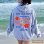 Only Thing More Powerful Than Hate Is Love Sweatshirt - Cozy Sand Crewneck for Activists